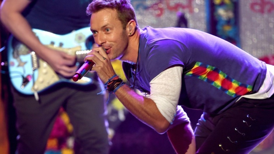 Coldplay's Chris Martin said after the canoodling couple were featured on the jumbotron: "Either they're having an affair or they're just very shy"