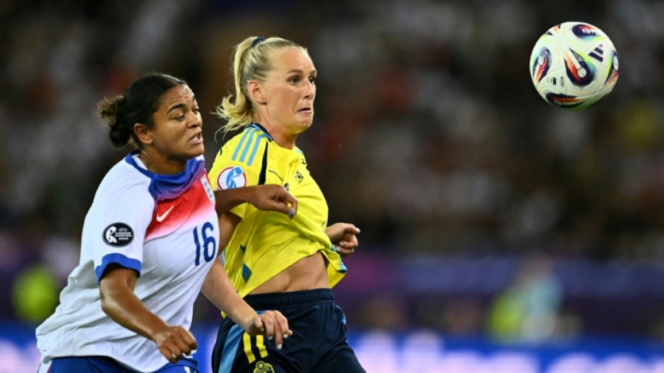 England defender Jess Carter (left) in action against Sweden at the Women's Euros