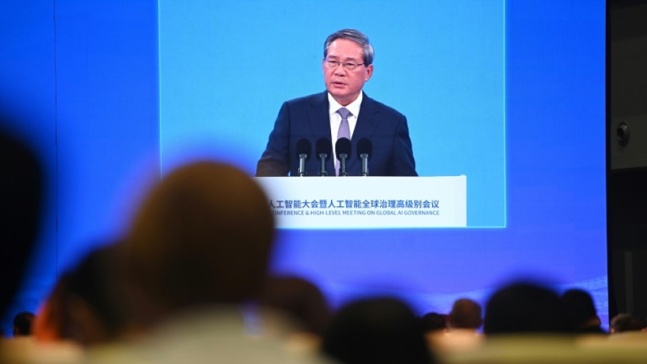 Chinese Premier Li Qiang is seen on a screen at the opening ceremony of the World Artificial Intelligence Conference in Shanghai on July 26, 2025