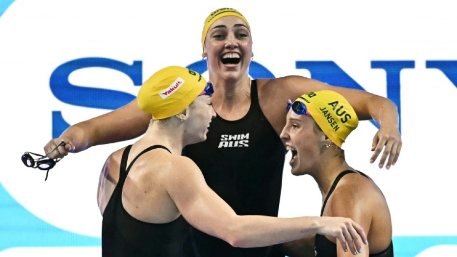 Australia celebrate winning the final of the women's 4x100m freestyle relay