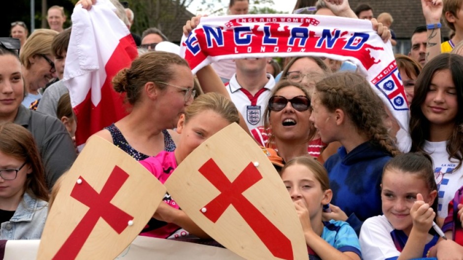 England fans wait to welcome the Lionesses at Southend airport