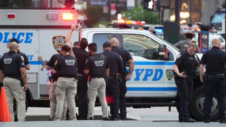 New York City police officers deployed a drone near Park Avenue at the height of the afternoon rush-hour as they investigated a possible active shooter situation
