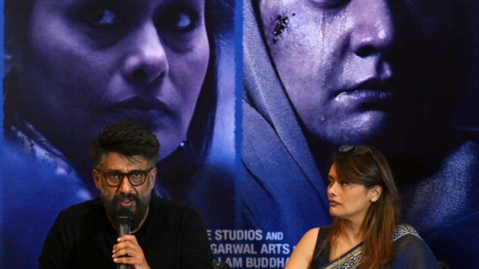 Indian film director Vivek Agnihotri (L) says viewers want to know what happened behind the scenes of the military operation