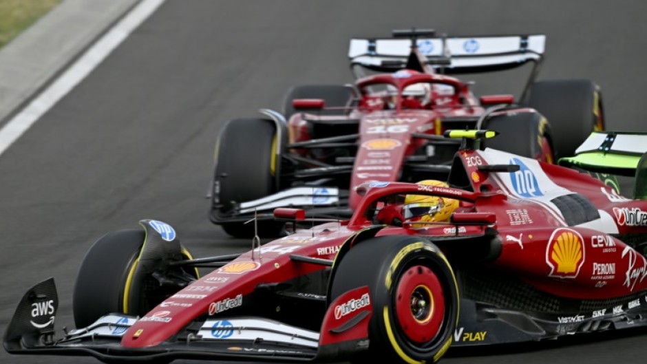 Ferrari's Lewis Hamilton (foreground) and teammate Charles Leclerc during practice at the Hungaroring