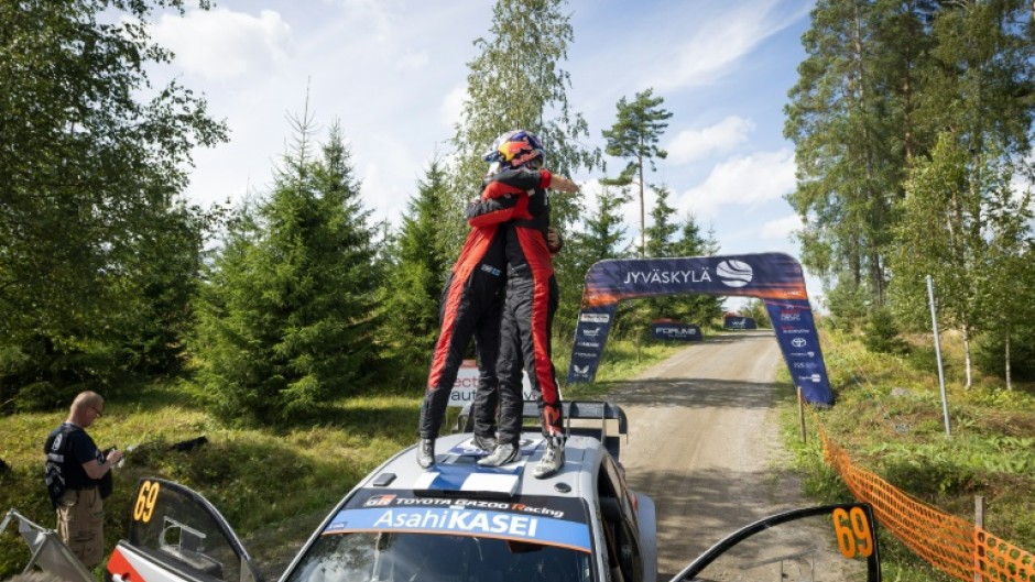 Finnish driver Kalle Rovanpera (R) won his home rally for the first time to raise his hopes of a third world title
