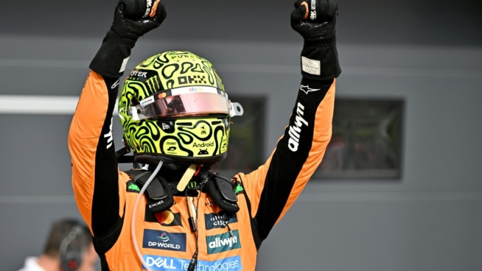 Lando Norris celebrates after fending off McLaren teammate Oscar Piastri in Hungary