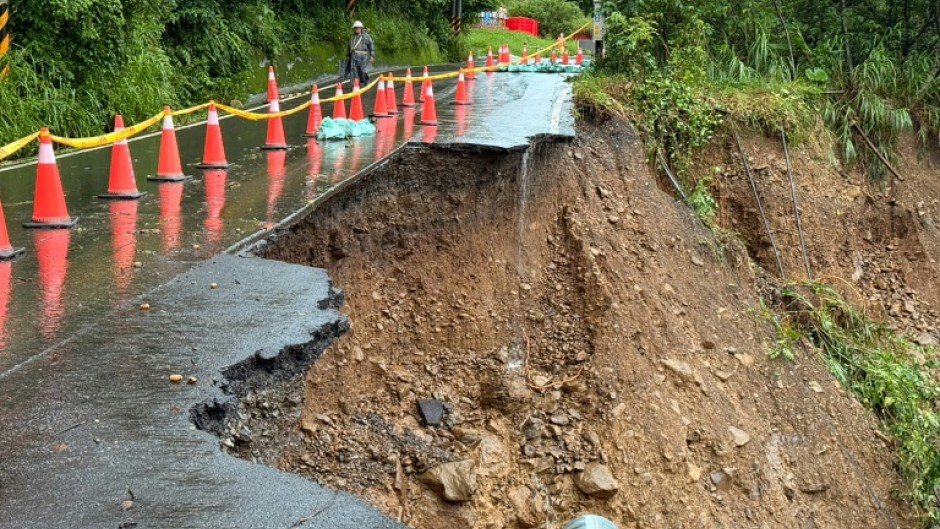 The site of a landslide that swept away a section of road causing a car transporting five people to plunge into a ravine, in a mountainous area of Kaohsiung