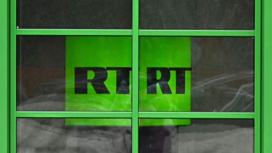 A photograph taken in Moscow in January 2023 shows the logo of RT (Russia Today) TV channel displayed at the company headquarters