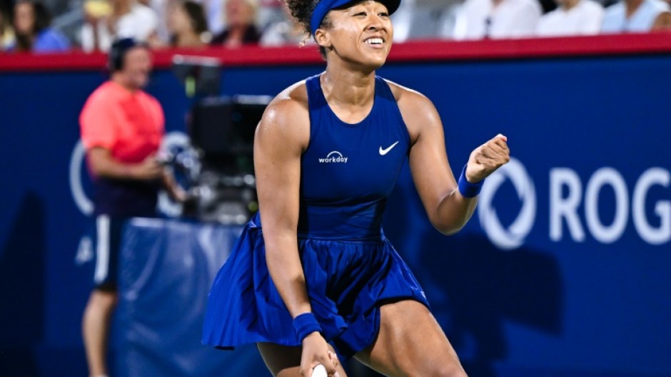 Japan's Naomi Osaka celebrates a victory against Clara Tauson of Denmark in the semi-finals of the WTA Canadian Open in Montreal