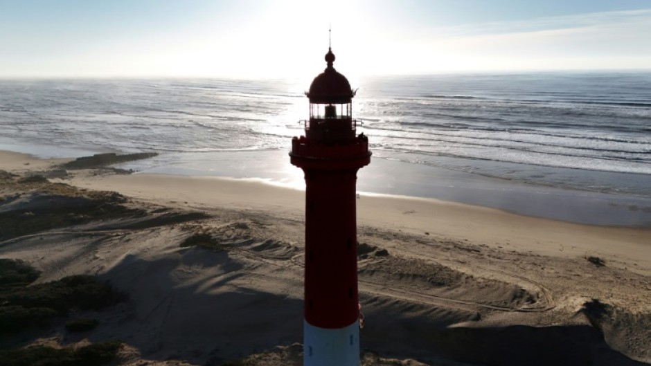 This aerial picture shows a French lighthouse threatened by coastal erosion