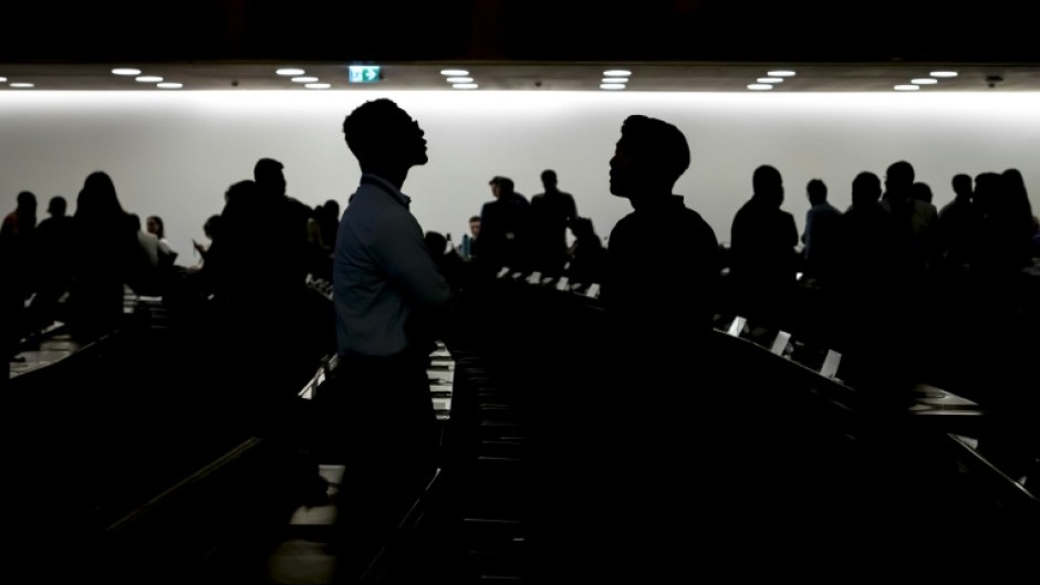 Delegates are meeting in the main assembly hall at the UN Palais des Nations in Geneva