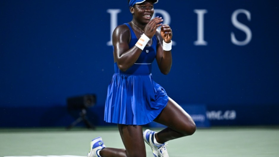 Canadian teen Victoria Mboko celebrates after beating Japan's Naomi Osaka in the WTA Canadian Open final