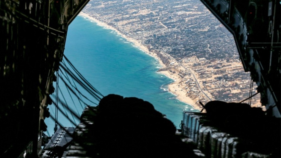 A German Air Force plane releasing humanitarian aid over the Gaza Strip on August 5, 2025