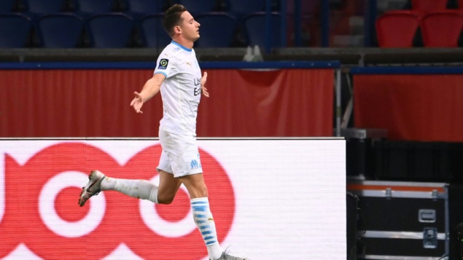 Florian Thauvin celebrates after scoring for Marseille against Paris Saint-Germain in 2020