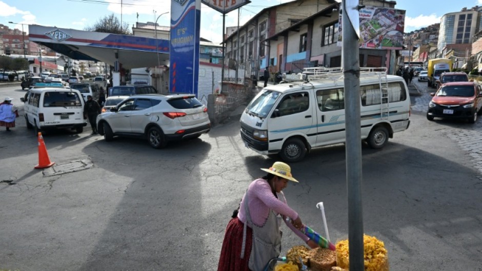 Long lines for fuel at petrol stations have become a defining image of Bolivia's worst economic crisis in a generation