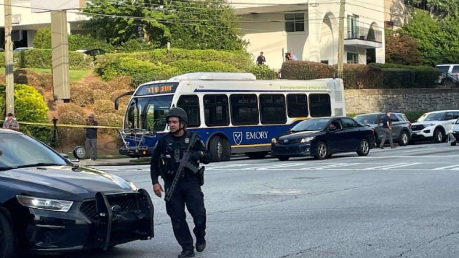 A gunman killed a police officer Friday near the headquarters of the Centers for Disease Control in the US city of Atlanta before being found dead at the scene, authorities said
