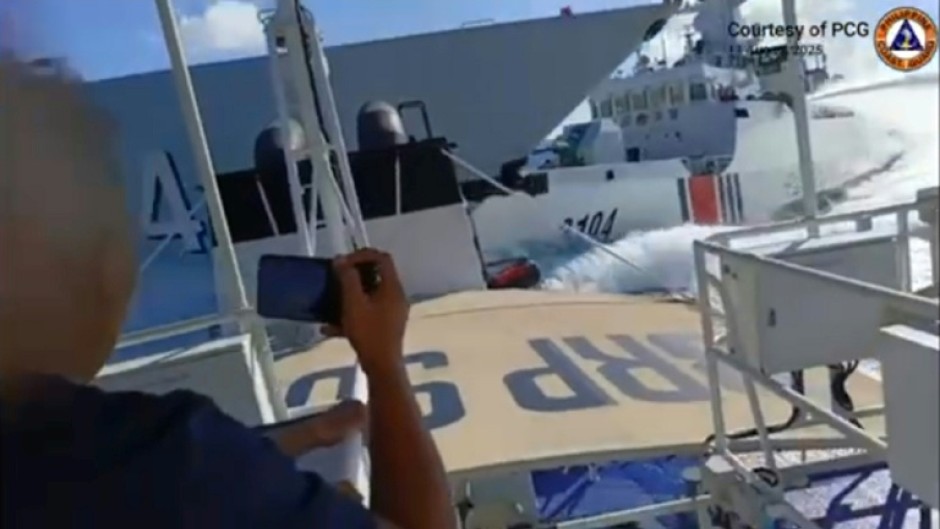 This screen grab released by the Philippine Coast Guard shows the Monday incident between a Chinese Navy vessel (L) and a China Coast Guard ship