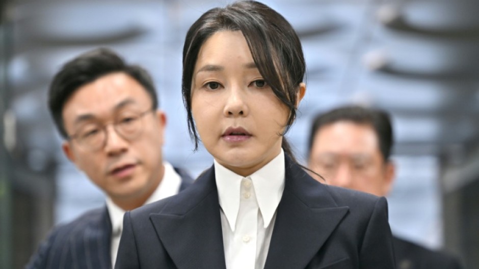 South Korea's former first lady Kim Keon Hee, wife of impeached former president Yoon Suk Yeol, arrives for a hearing at the Seoul Central District Court on August 12