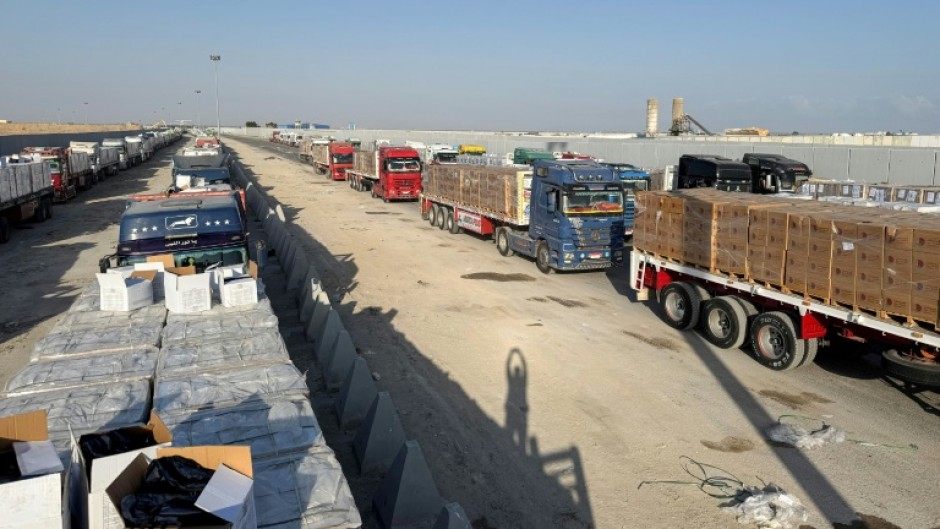 Long lines of aid trucks wait on the Egyptian side of the Gaza border for Israeli permission to enter the Palestinian territory.