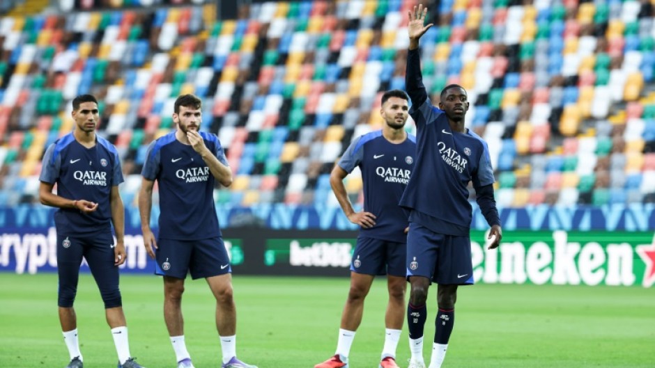 Ousmane Dembele (R) and Paris Saint-Germain teammates Goncalo Ramos, Khvicha Kvaratskhelia and Achraf Hakimi are back in action again after a short summer break