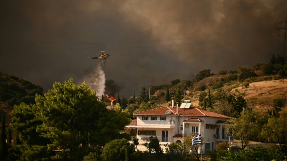 Firefighters in Patras were facing 'scattered' pockets but the fire was 'still active' in the eastern outskirts of the city