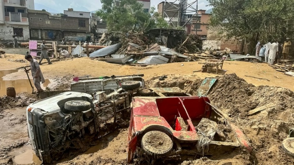 Most were killed in flash floods and collapsing houses