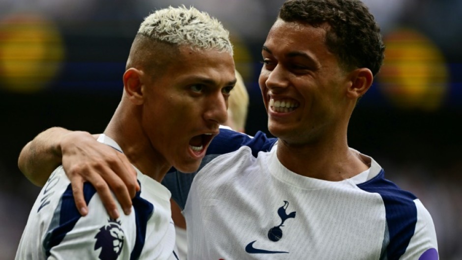Richarlison (L) scored twice and Brennan Johnson once as Tottenham opened their Premier League season with a 3-0 win over Burnley