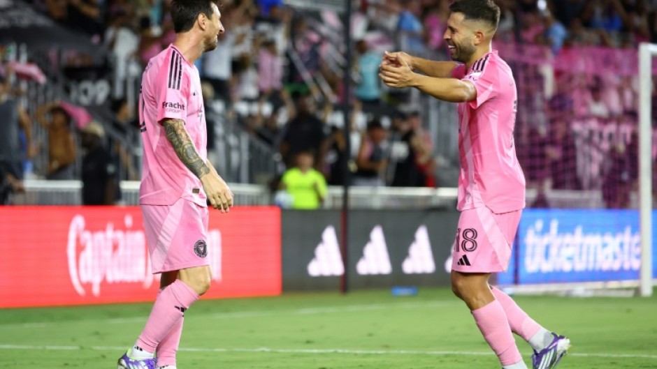Inter Miami's Lionel Messi, left, celebrates scoring a goal with temmate Jordi Alba, right, in the club's 3-1 MLS home victory over the Los Angeles Galaxy