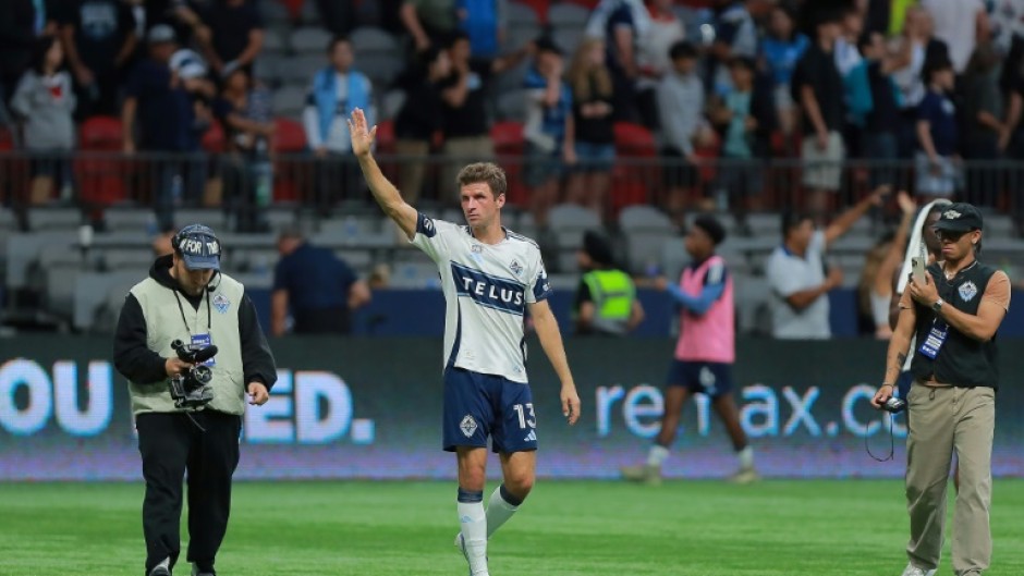 Thomas Mueller salutes fans after making his Major League Soccer debut for Vancouver Whitecaps in a 1-1 draw with Houston Dynamo
