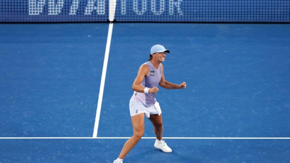 Iga Swiatek celebrates after defeating Jasmine Paolini to win the Cincinnati Open