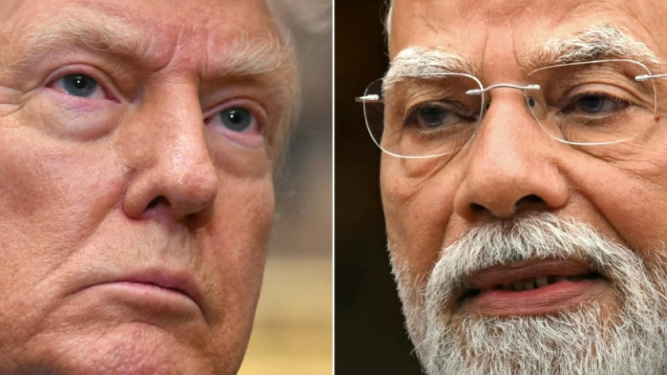 Indian Prime Minister Narendra Modi (R) is slashing consumption taxes as his economy braces for painful US tariffs levied by President Donald Trump
