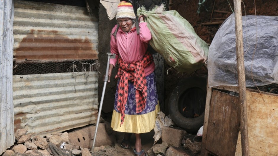 Molly Aluoch collects plastic daily to exchange for points giving her access to clean toilets, showers, laundries and even meals
