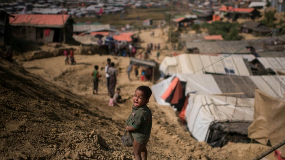 Refugees receive a ration card worth about $12 a month, enough for rice but not nutritious food