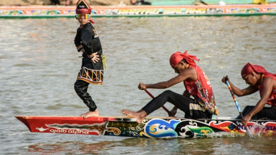 Rayyan Arkan Dikha, an 11-year-old boy who went viral for his calm dance on the bow of a traditional longboat, performs during the Pacu Jalur race festival