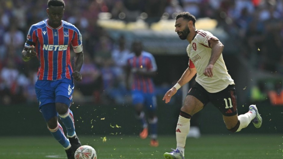 Crystal Palace star Marc Guehi (L) says living with his parents and sisters is the perfect balance to his high pressure career