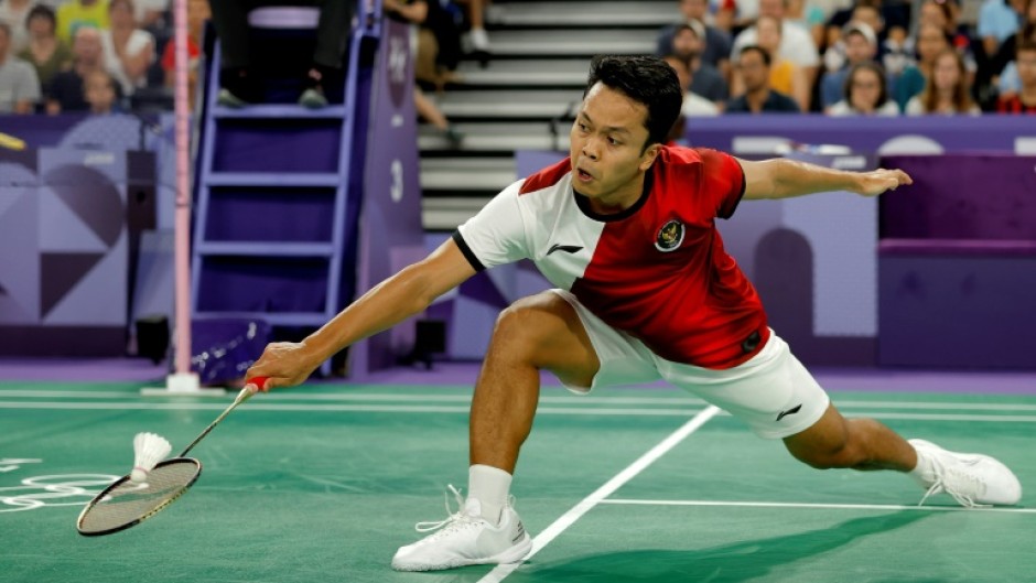 Indonesia's Anthony Ginting in action against France's Toma Junior Popov at the Paris 2024 Olympic Games