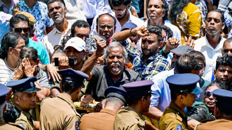 Supporters of Sri Lanka's jailed former president Ranil Wickremesinghe protested before his bail hearing