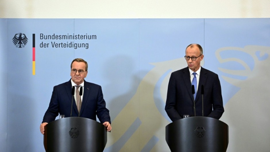 German Chancellor Friedrich Merz, on the right, and Defence Minister Boris Pistorius announce plans to boost army recruitment