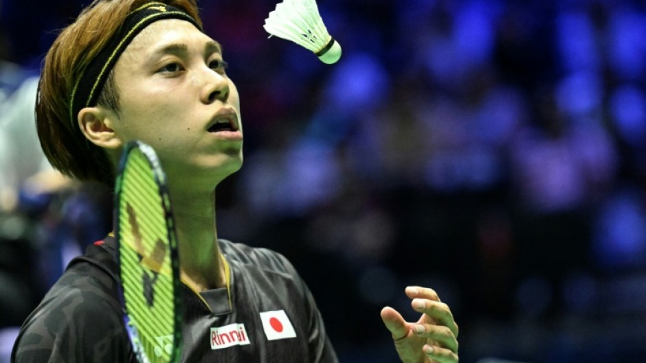 Japan's Kodai Naraoka tosses up a shuttlecock at the badminton world championships in Paris on August 28
