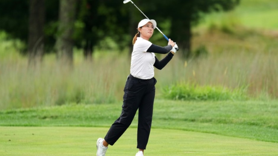 China's Miranda Wang grabbed a two-stroke lead in the storm-hit second round of the LPGA's FM Championship at TPC Boston