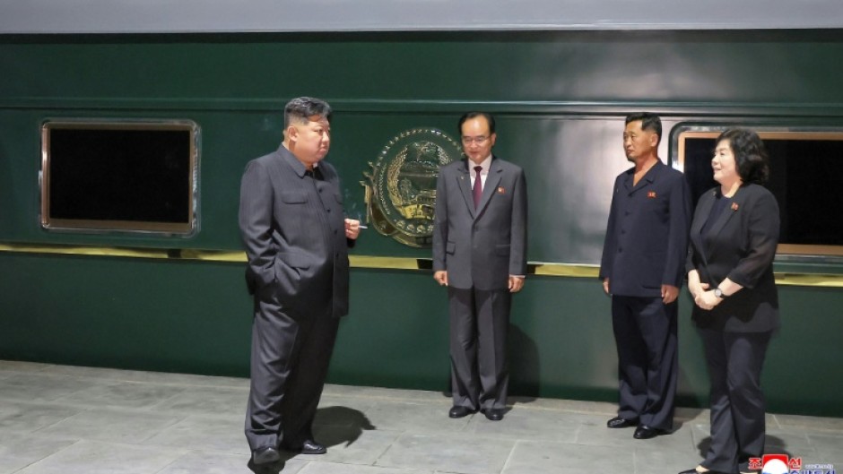 This picture taken on September 1, 2025 and released from North Korea's official Korean Central News Agency via KNS shows Kim outside his train