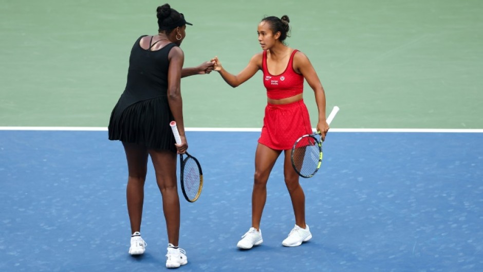 Venus Williams (left) celebrates a point with Leylah Fernandez during their US Open doubles defeat to top seeds Taylor Townsend and Katerina Siniakova