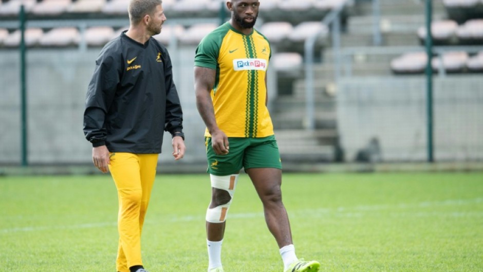 South Africa's Siya Kolisi with his leg in heavy strapping last month in Cape Town