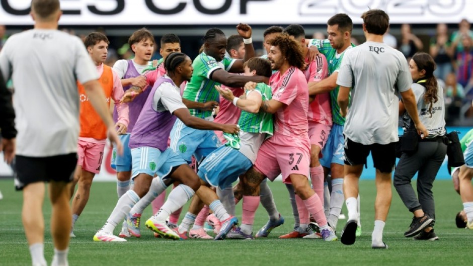 Players of Seattle Sounders and Inter Miami CF fight after the Sounders' victory in the Leagues Cup final