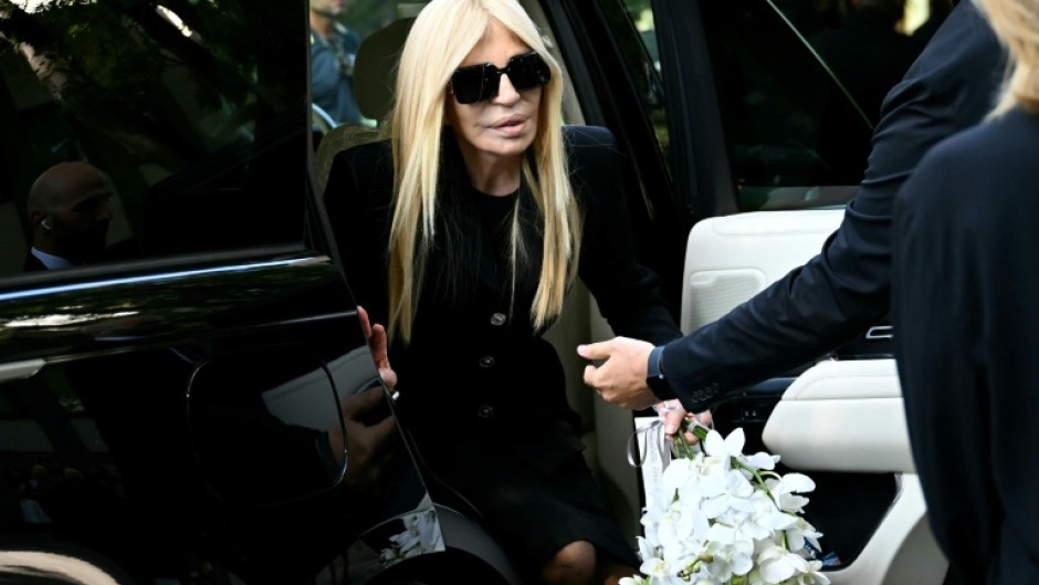 Italian fashion designer Donatella Versace arrives at the Armani Theatre where late Italian fashion designer Giorgio Armani lies-in state, in Milan on September 6, 2025.