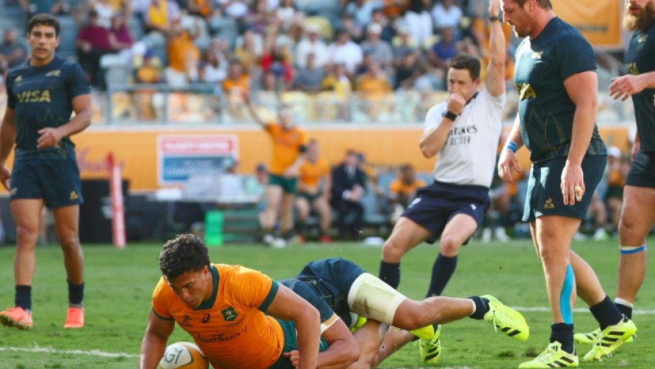 Australia’s Joseph-Aukuso Suaalii scores during their Rugby Championship clash with Argentina