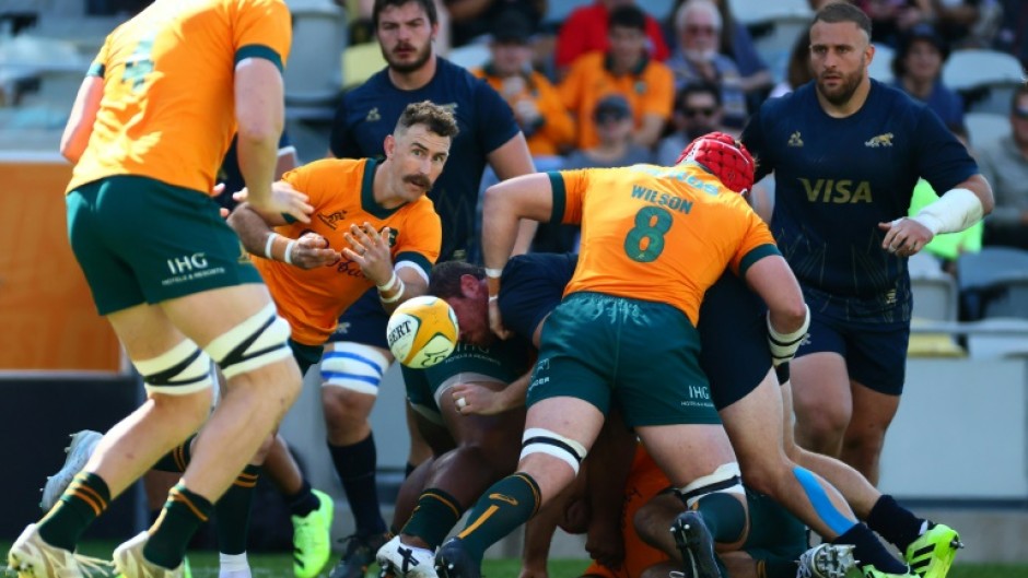Australia's Nic White (C) was among the try scorers against Argentina