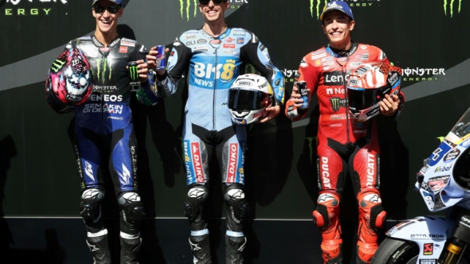 Pole position winner BK8 Gresini Racing MotoGP team's Spanish MotoGP rider Alex Marquez with Fabio Quartararo and his brother Marc Marquez