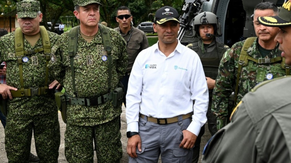 Colombian Defense Minister Pedro Sanchez tours a coca eradication program on Colombia's restive border with Ecuador