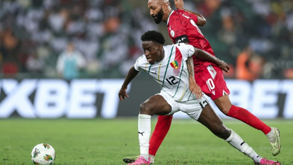 Equatorial Guinea captain Emilio Nsue (R) was barred from 2026 World Cup qualifying, then reinstated.